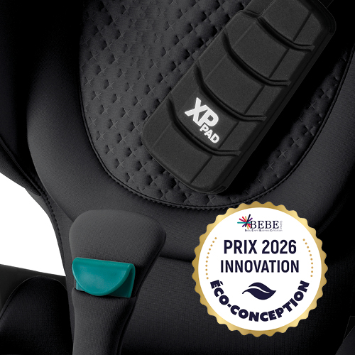 Close-up of a Britax R&ouml;mer KIDFIX PRO highback booster seat highlighting the Eco-Design Innovation 2026 Award logo and LUX collection distinctive 3D star embossing